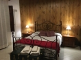 Rooms in the vineyard villa: bedroom.
